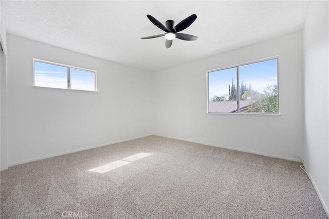 2100 Butterfield Ave, Bakersfield, CA 93304 - carpeted spare room featuring ceiling fan and baseboards