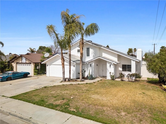 mid-century modern home featuring stucco siding, a front lawn, fence, concrete driveway, and an attached garage