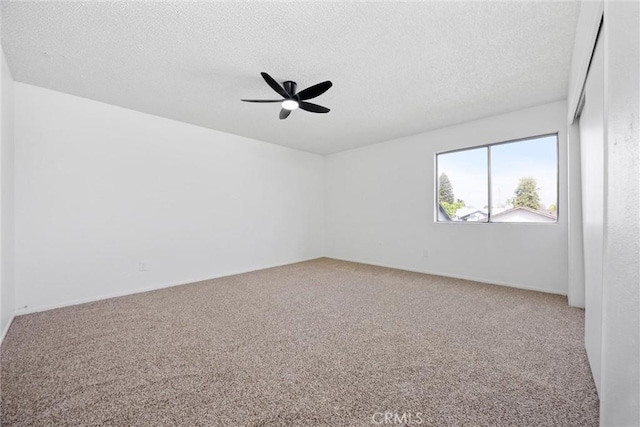 2100 Butterfield Ave, Bakersfield, CA 93304 - spare room featuring carpet floors, ceiling fan, and a textured ceiling