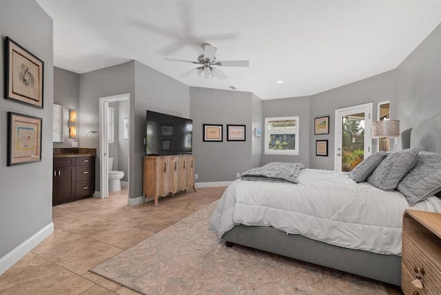 bedroom featuring a ceiling fan, recessed lighting, baseboards, and connected bathroom