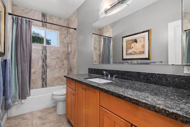 full bathroom with vanity, tile patterned floors, toilet, and shower / bath combo with shower curtain