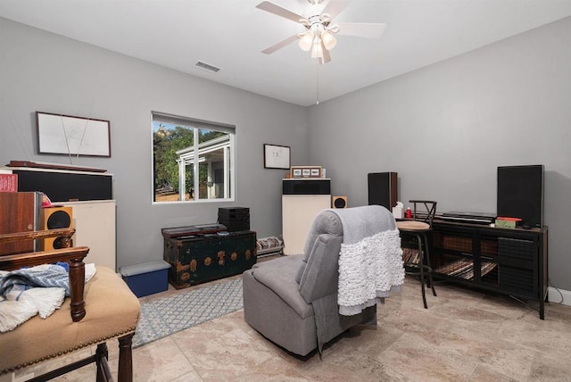 office area featuring visible vents and a ceiling fan