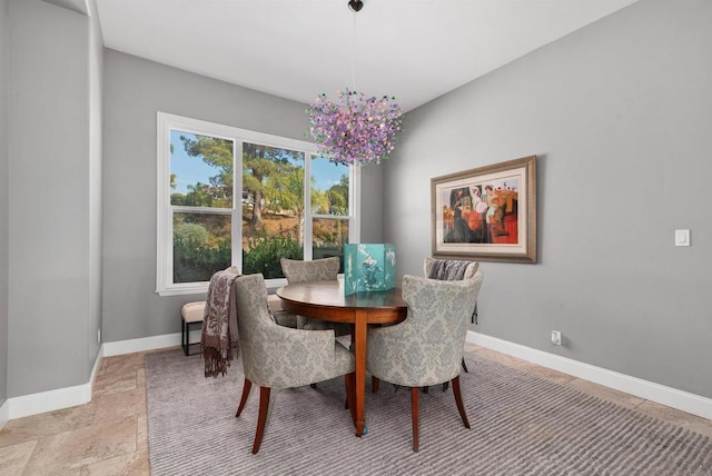 dining room with baseboards