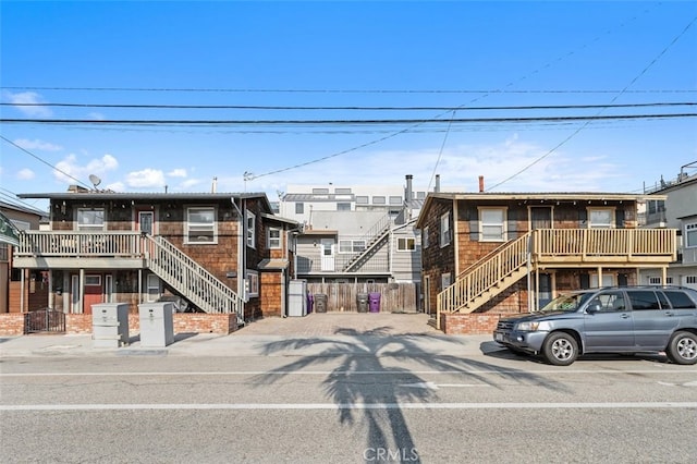 view of front of property featuring stairs