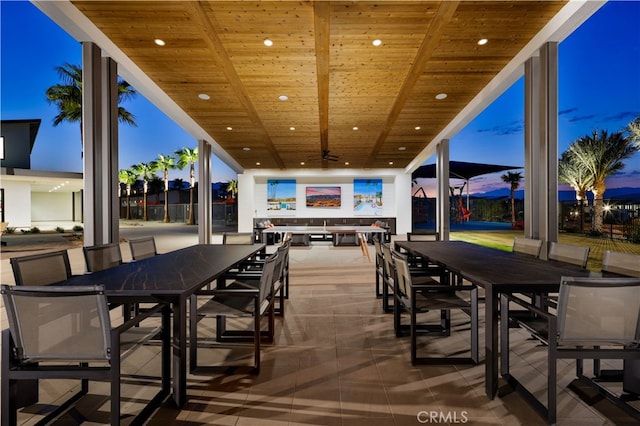 view of patio featuring outdoor dining area