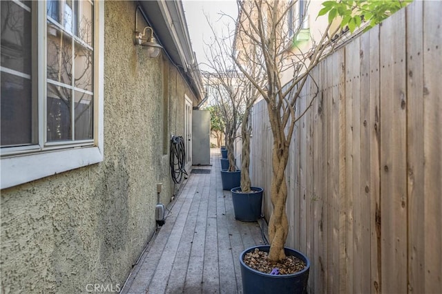 view of side of property with stucco siding