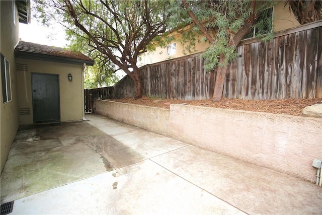 view of patio featuring a fenced backyard