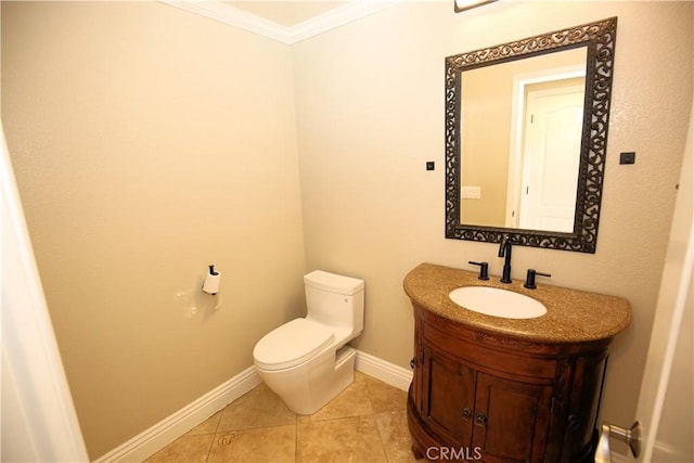 bathroom with tile patterned floors, toilet, ornamental molding, baseboards, and vanity