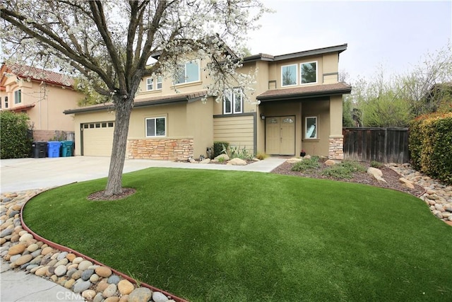 view of front facade with fence, stucco siding, concrete driveway, a front lawn, and stone siding