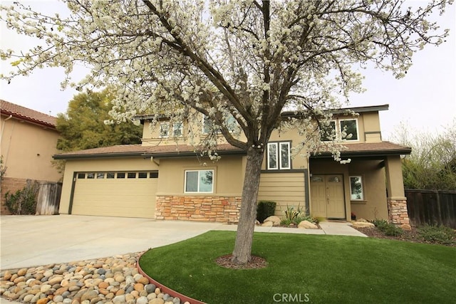 view of front of house featuring a front yard, stone siding, driveway, and stucco siding