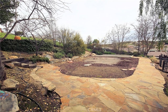 view of yard featuring fence