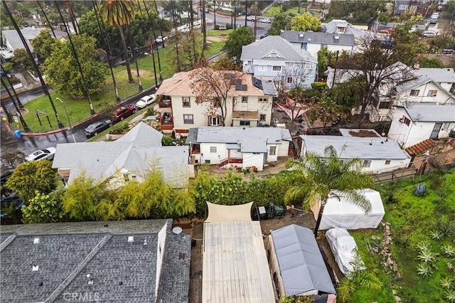 birds eye view of property with a residential view