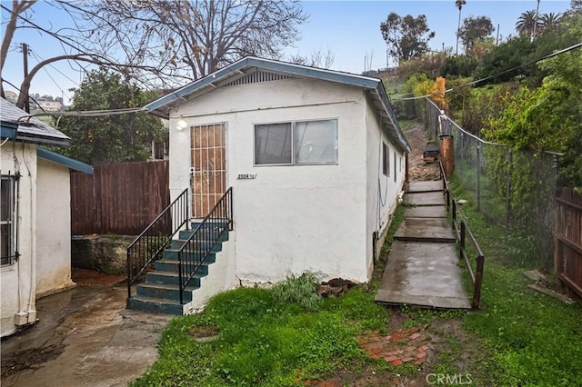 view of outdoor structure with a fenced backyard