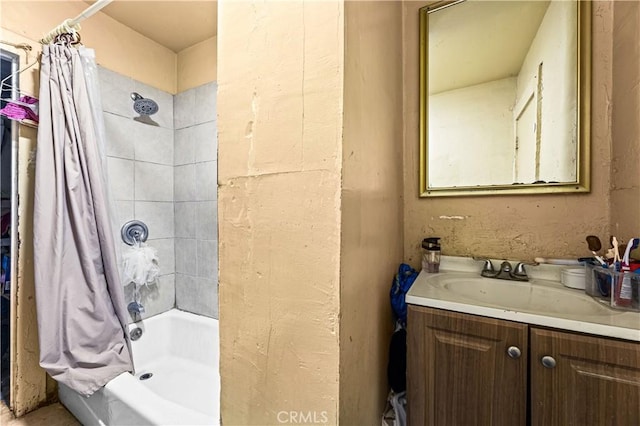 full bathroom featuring vanity and shower / bathtub combination with curtain