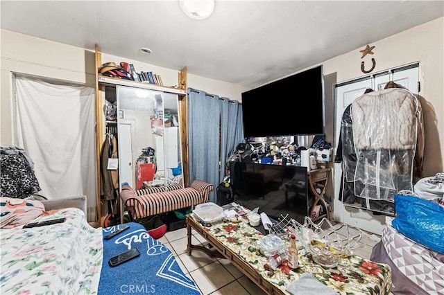 bedroom with tile patterned floors