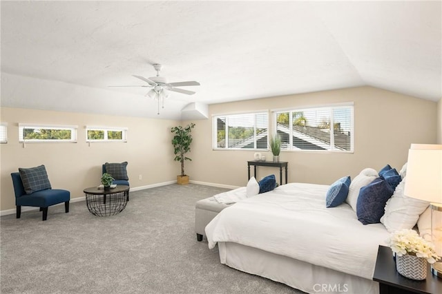 carpeted bedroom with baseboards, lofted ceiling, and ceiling fan