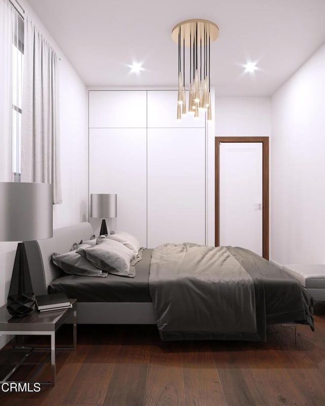 bedroom with recessed lighting and dark wood-style flooring