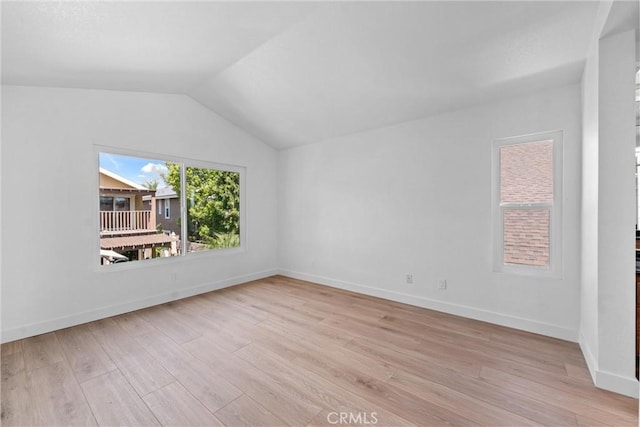 3266 Ashgate Ct, Ontario, CA 91761 - empty room featuring baseboards, light wood-type flooring, and vaulted ceiling
