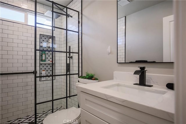 full bathroom with a stall shower, toilet, and vanity