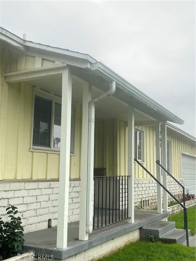 entrance to property with a porch