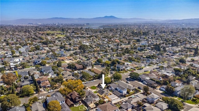 aerial view featuring a mountain view and a residential view