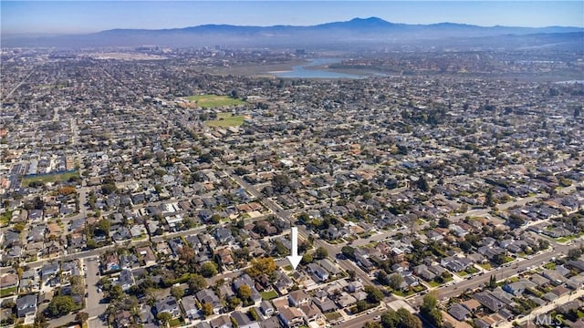 drone / aerial view with a mountain view and a residential view