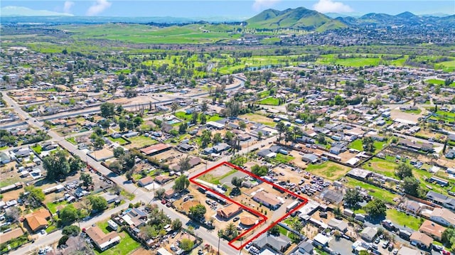 aerial view featuring a residential view and a mountain view