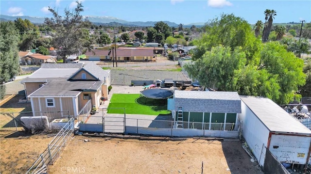 exterior space with a residential view and a mountain view