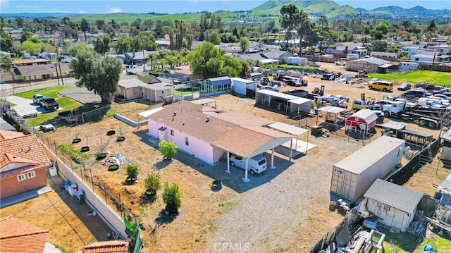 drone / aerial view featuring a mountain view and a residential view