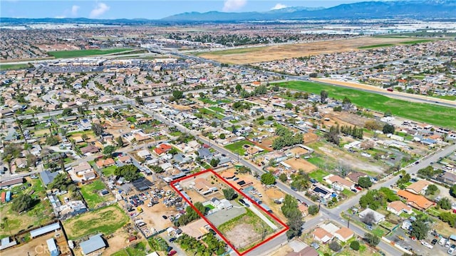 drone / aerial view with a mountain view and a residential view