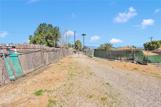 view of yard with a gate and fence