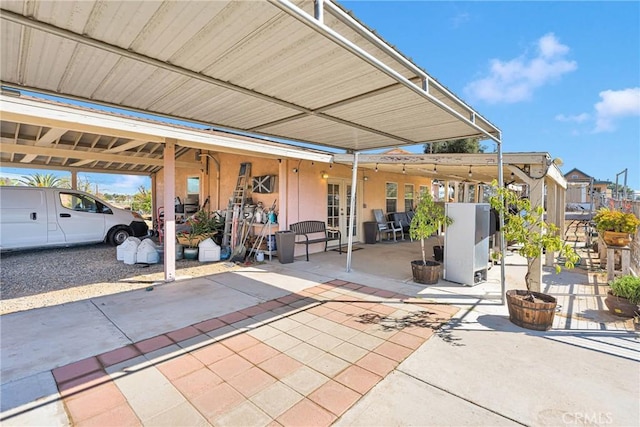 view of patio featuring french doors