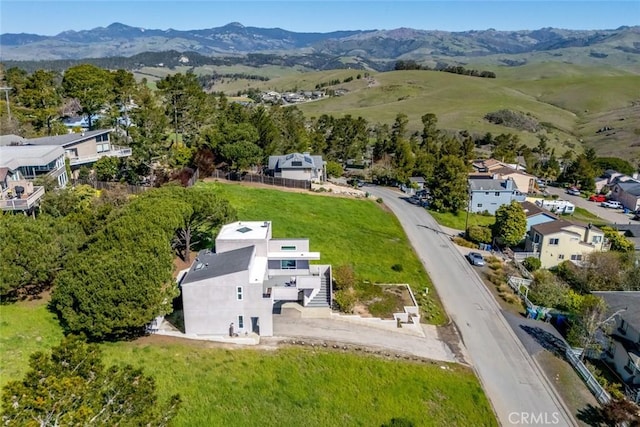 aerial view featuring a mountain view and a residential view