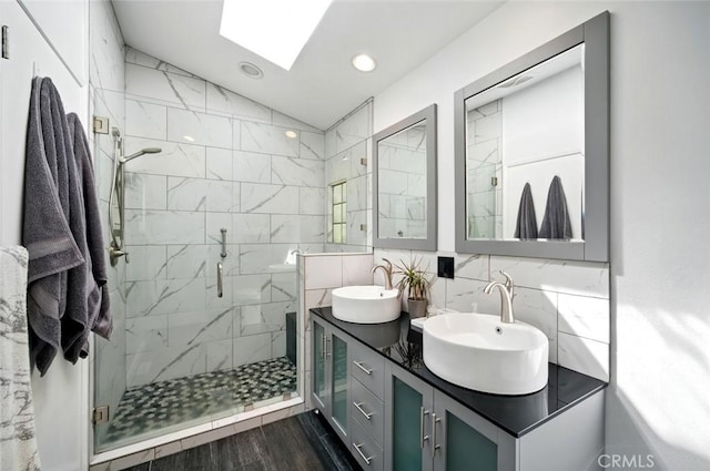1735 Spencer St, Cambria, CA 93428 - bathroom with a shower stall, double vanity, lofted ceiling, recessed lighting, and backsplash