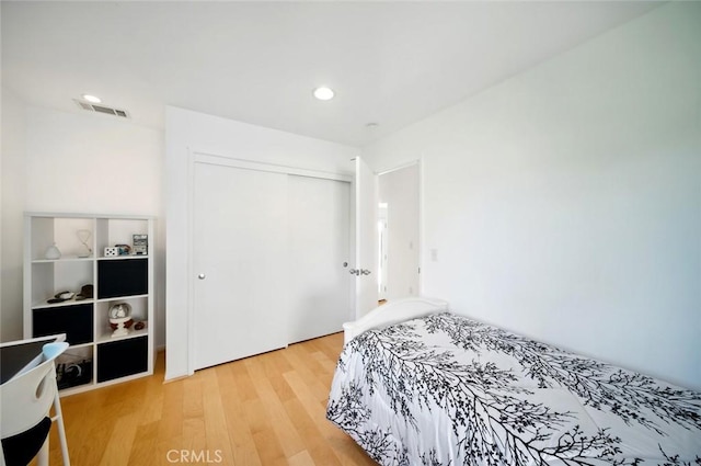 1735 Spencer St, Cambria, CA 93428 - bedroom featuring wood finished floors, a closet, and recessed lighting
