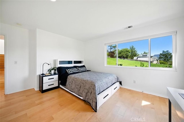 1735 Spencer St, Cambria, CA 93428 - bedroom with light wood-style floors and baseboards
