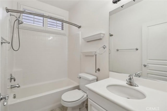 bathroom with vanity, toilet, and shower / bath combination