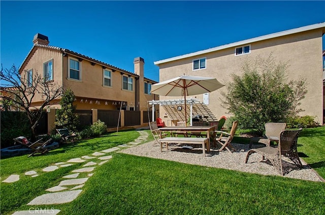 view of yard featuring a patio and fence