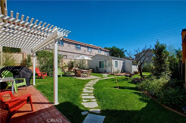 view of yard with a patio, a pergola, and a fenced backyard