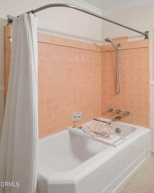 full bathroom with shower / bath combo with shower curtain and ornamental molding