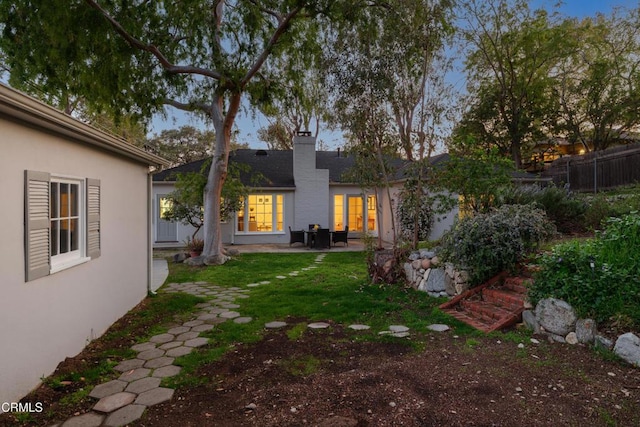 view of yard with a patio and fence