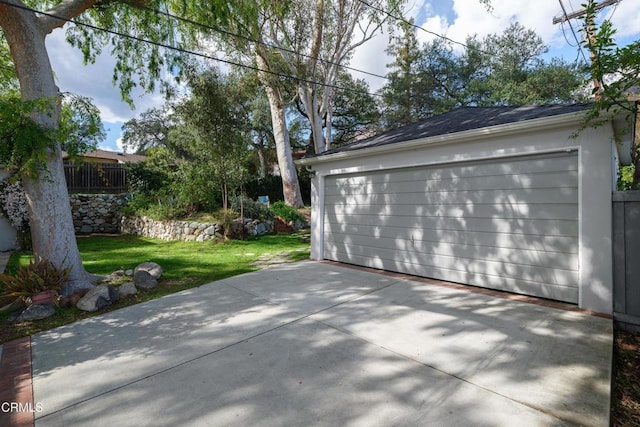 detached garage with fence