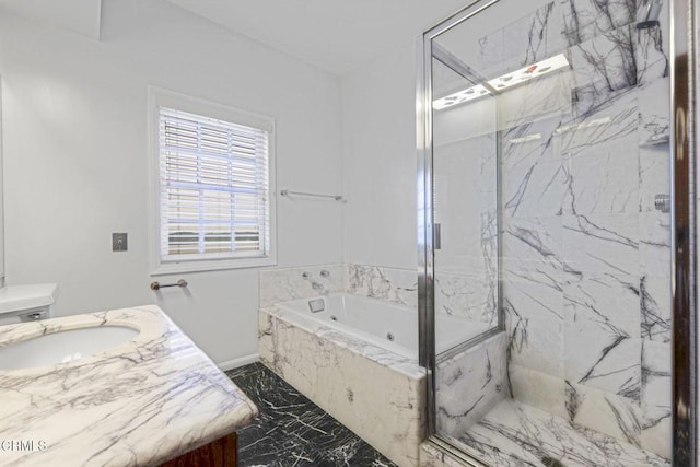 bathroom featuring vanity, a tub with marble appearance, marble finish floor, and a marble finish shower