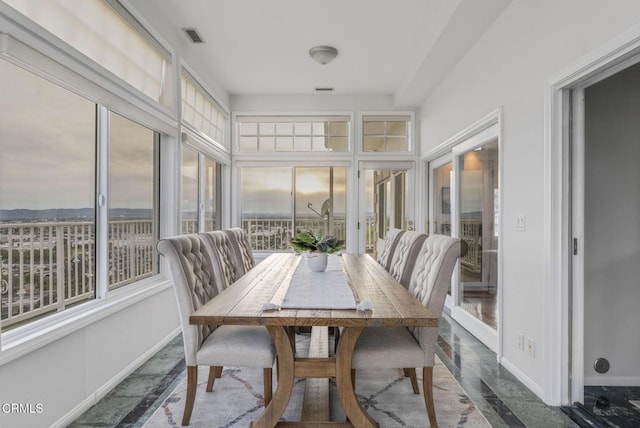 sunroom featuring visible vents