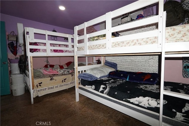 bedroom with concrete flooring
