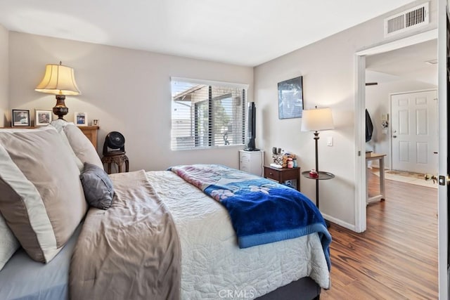 1335 Massachusetts Ave Unit 202, Riverside, CA 92507 - bedroom featuring wood finished floors and baseboards