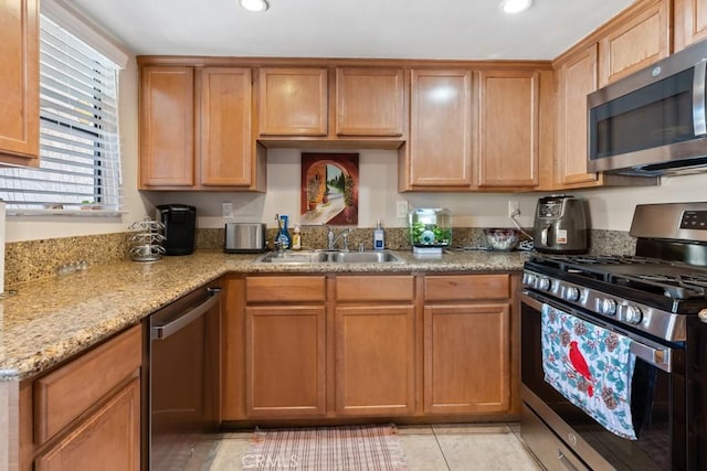 1335 Massachusetts Ave Unit 202, Riverside, CA 92507 - kitchen with stainless steel appliances, recessed lighting, light tile patterned floors, and light stone countertops