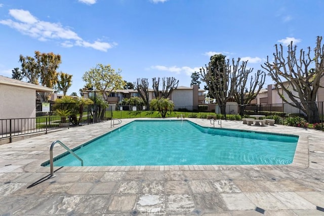 1335 Massachusetts Ave Unit 202, Riverside, CA 92507 - community pool featuring a patio area and a residential view