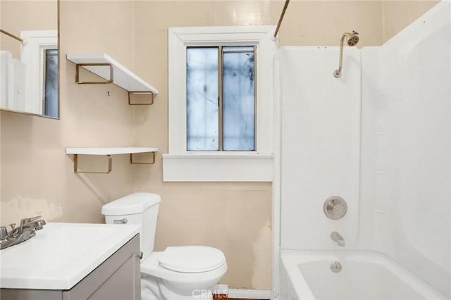 full bathroom featuring  shower combination, toilet, and vanity
