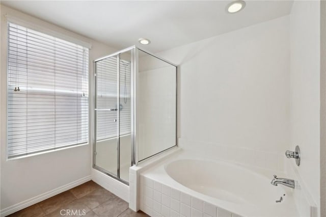 full bath with a garden tub, baseboards, recessed lighting, a stall shower, and tile patterned floors